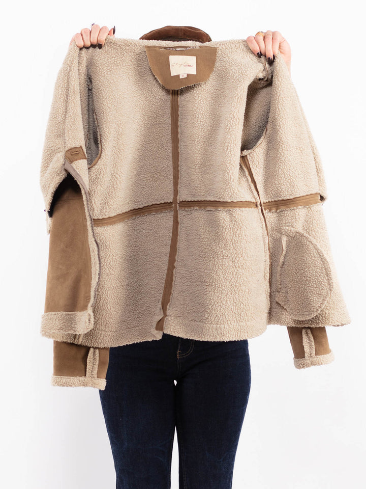 Vintage 90. gadu sieviešu mākslīgā šepādas jaka bēšā krāsā