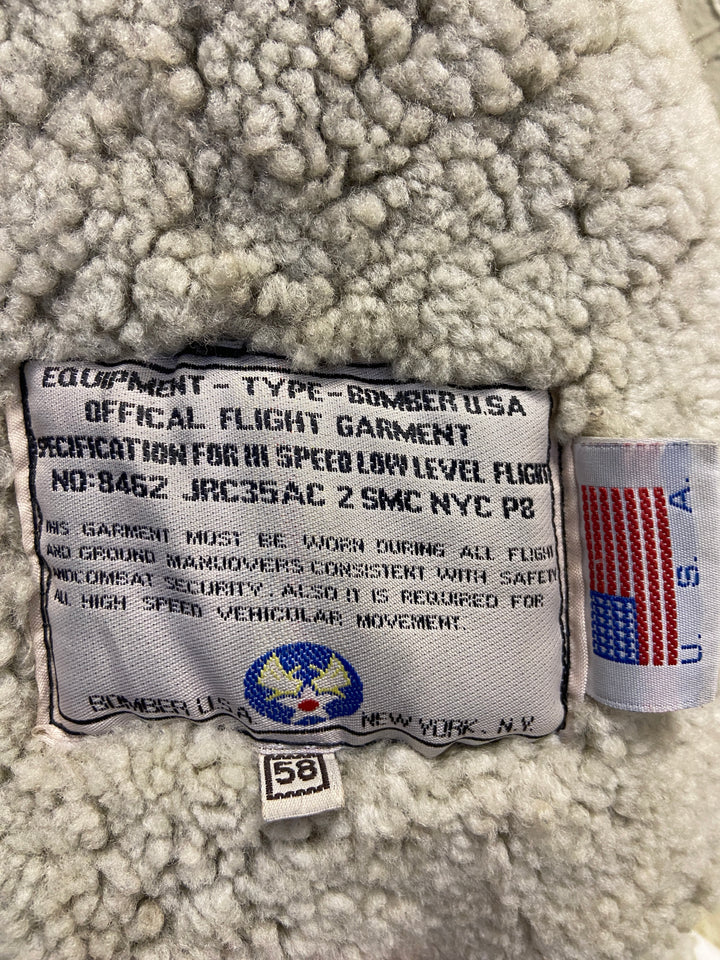 Vintage 80. gadu vīriešu B-3 stila aitādas bomberjaka pelēkā krāsā