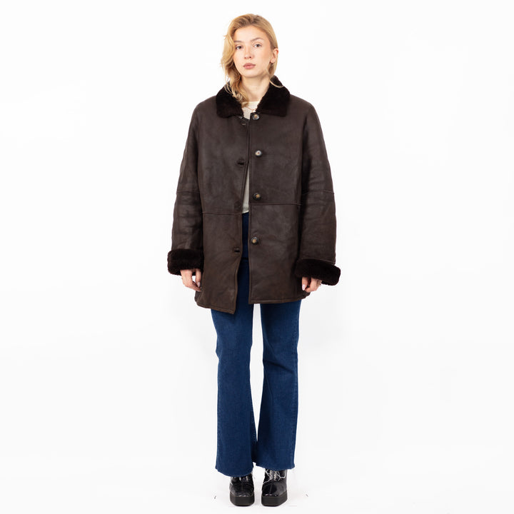 Vintage 90. gadu sieviešu aitādas ādas mētelis brūnā krāsā