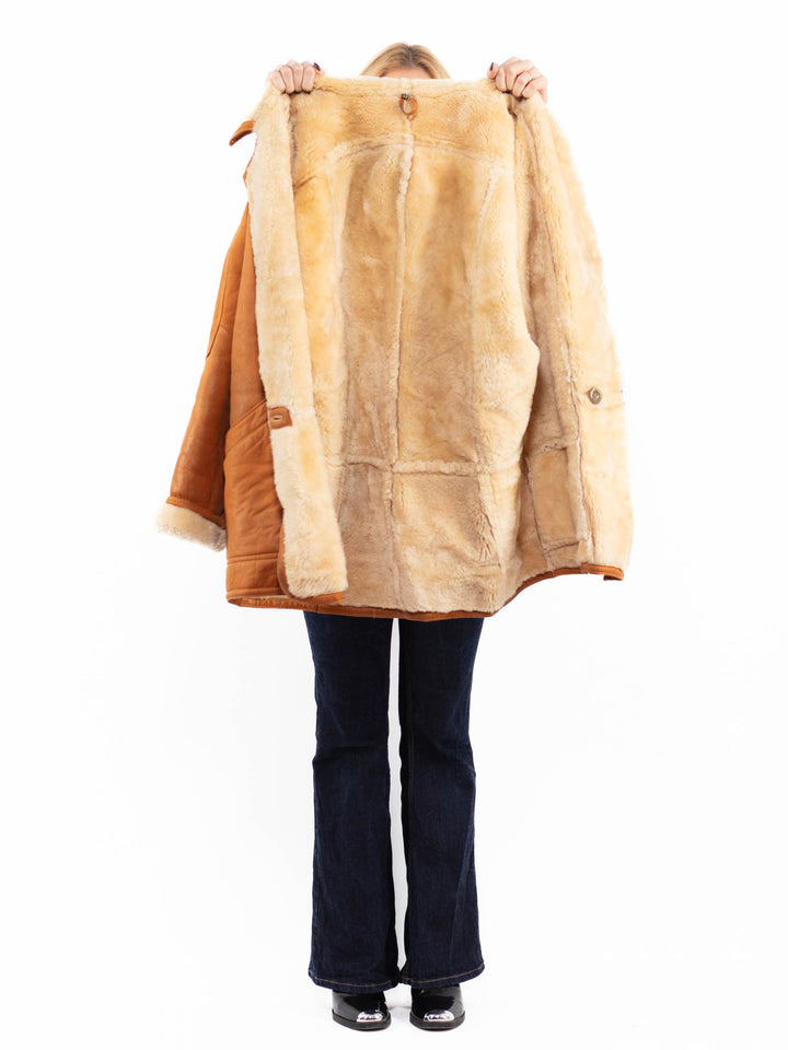 Vintage 90's Women Oversized Sheepskin Coat in Brown