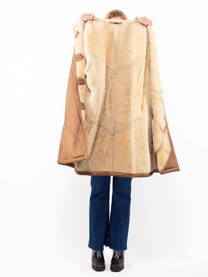 Vintage 90's Women Oversized Sheepskin Coat in Brown