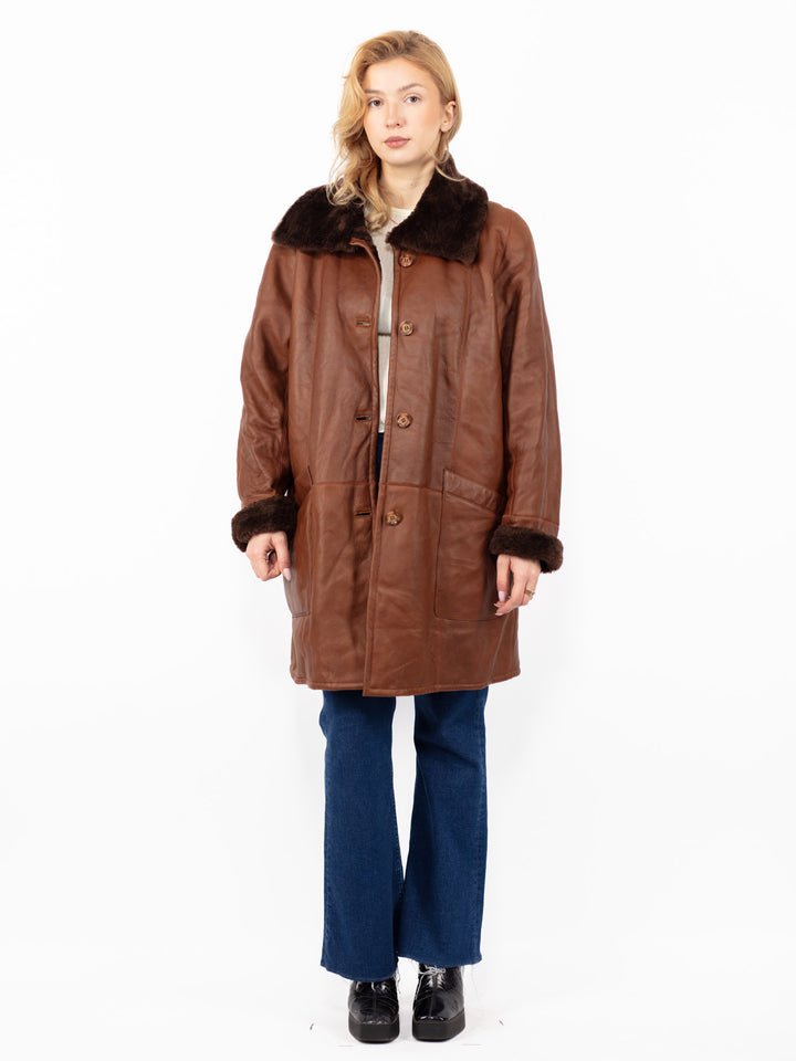 Vintage 90. gadu sieviešu aitādas ādas mētelis brūnā krāsā