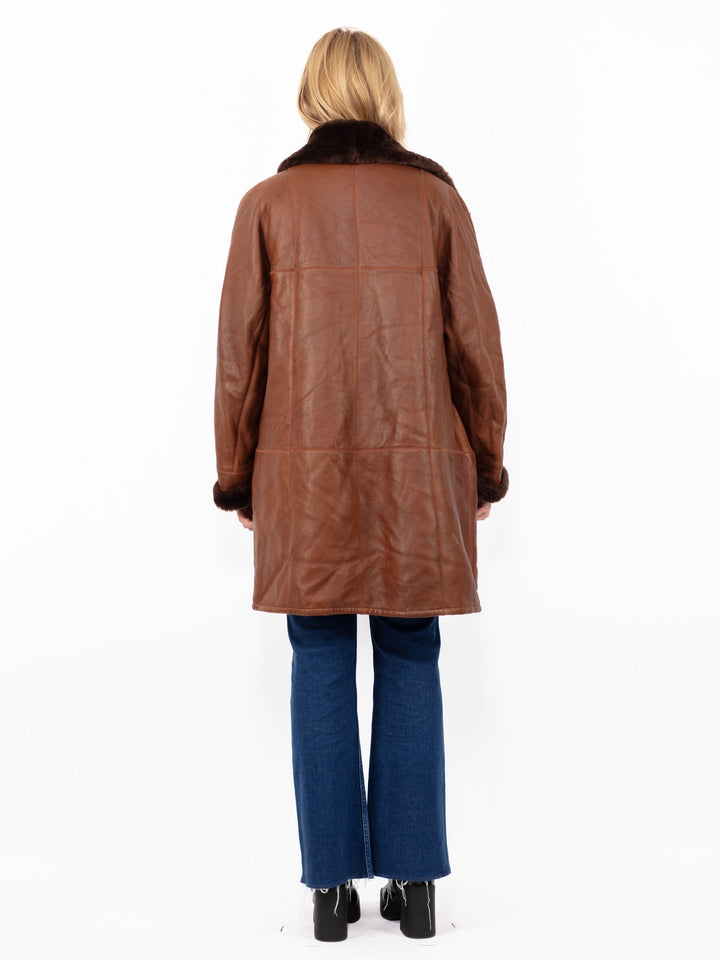 Vintage 90. gadu sieviešu aitādas ādas mētelis brūnā krāsā